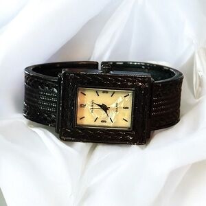 Narmi black quartz cuff watch